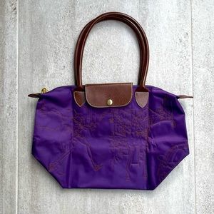 NEW Embroidered purple handbag
